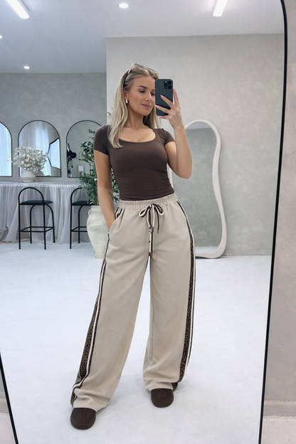 BEIGE WIDE LEG JOGGERS WITH CONTRAST LEOPARD PRINT - Angeleene